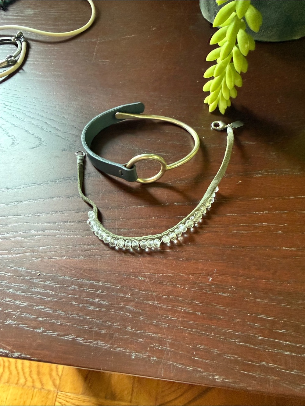 Two gray bracelets. J Jill and leather cuff